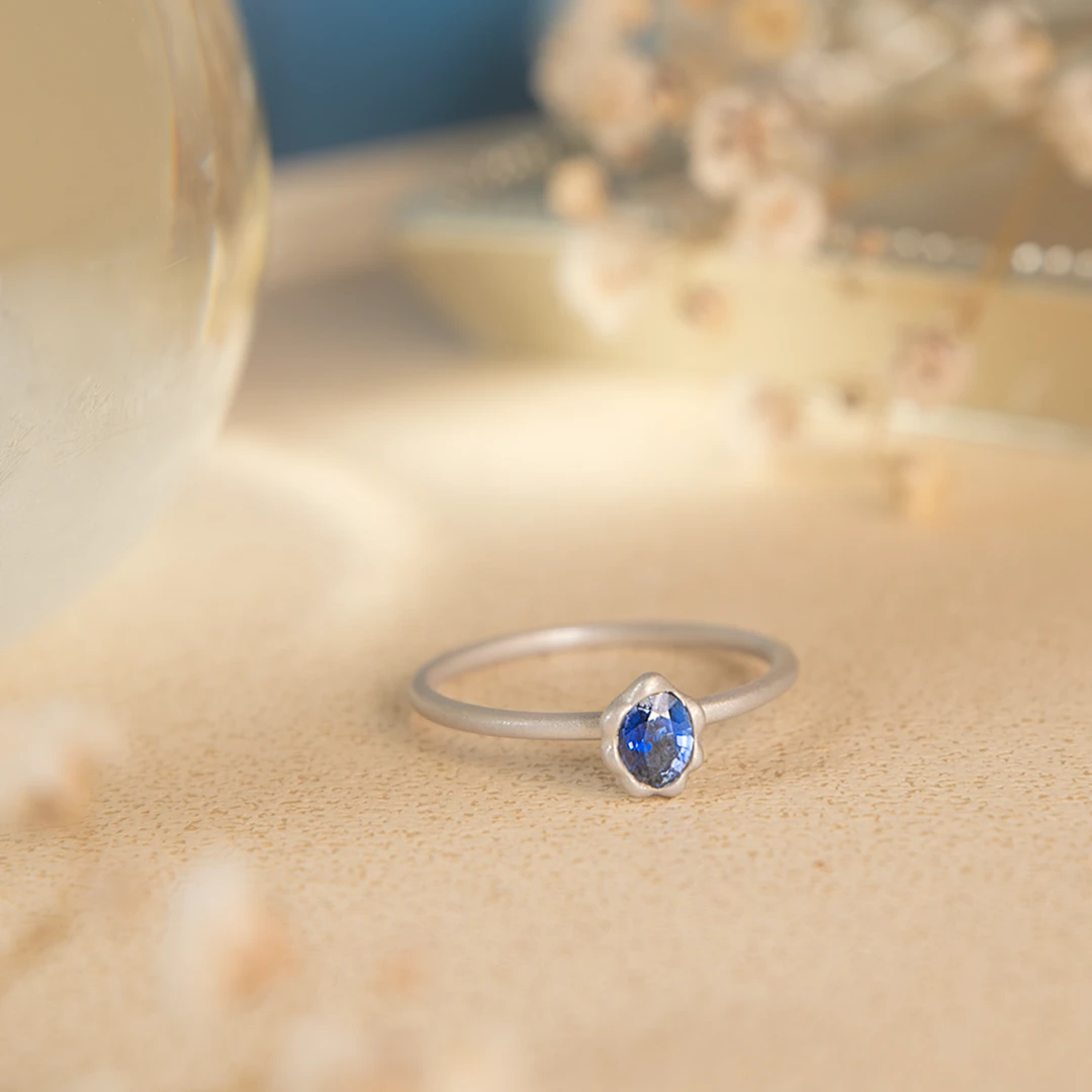 Melted gold blue sapphire ring